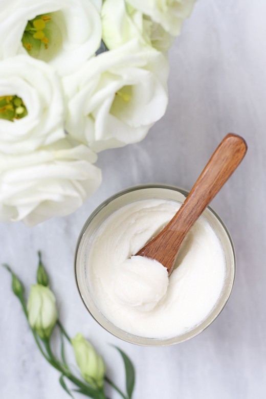 Homemade cleansing balm with white flowers