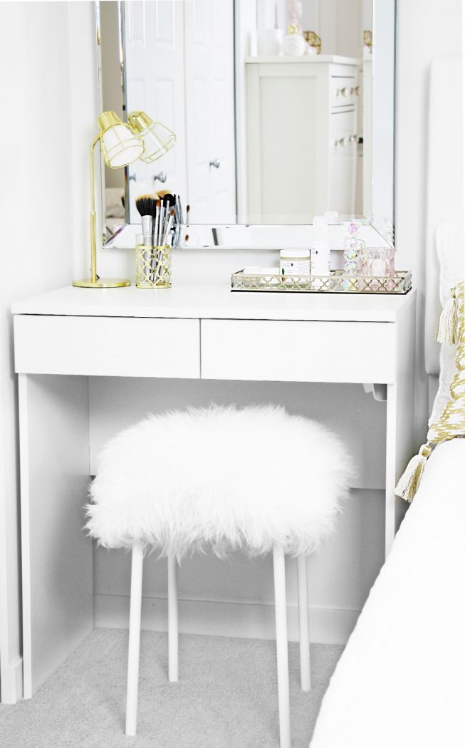 DIY fuzzy stool styled underneath IKEA dressing table in girls' bedroom