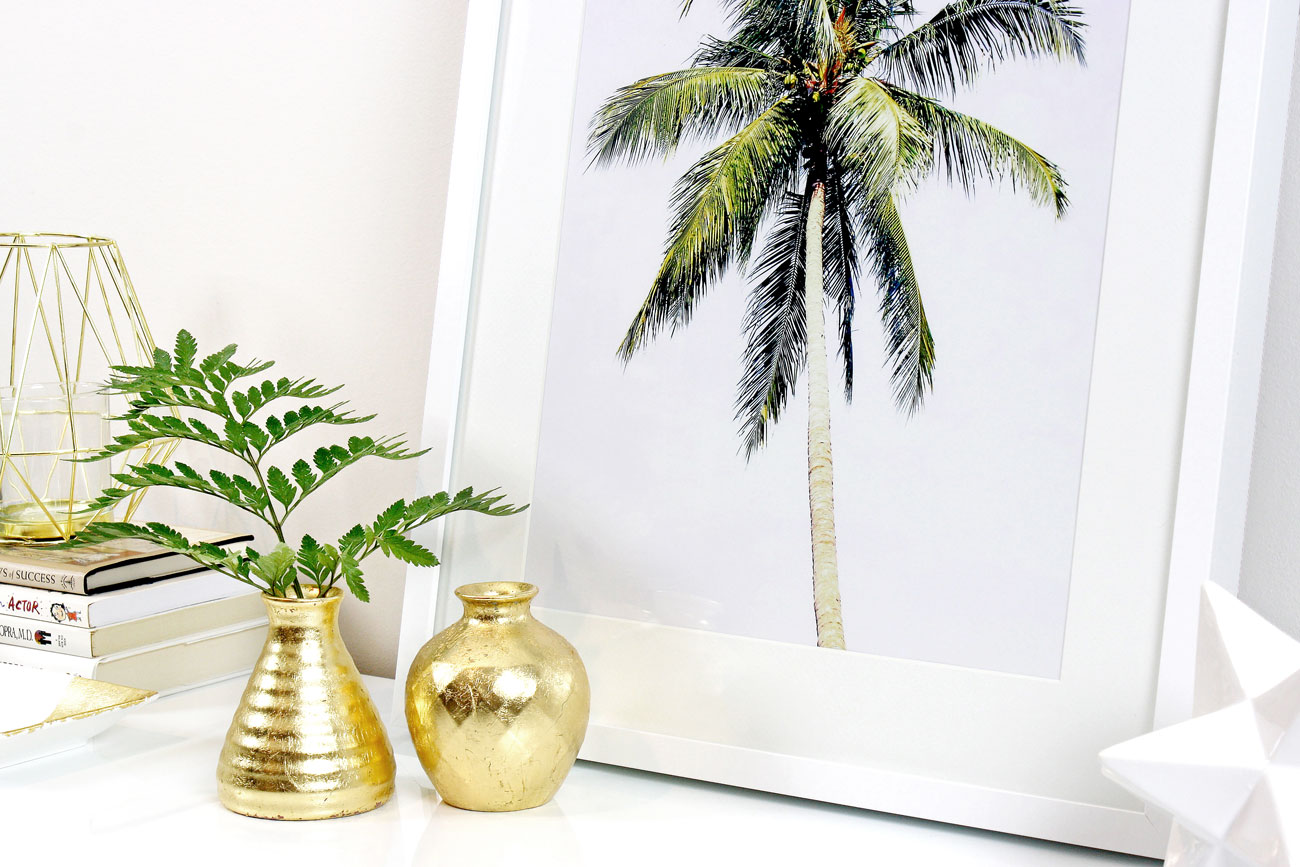 DIY IKEA gold leaf vases styled on credenza with palm tree print
