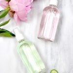 Bottles of DIY makeup setting spray with rosewater and glycerin
