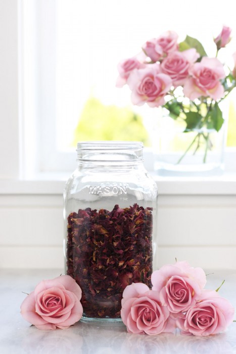 Glass jar full of dried rose petals