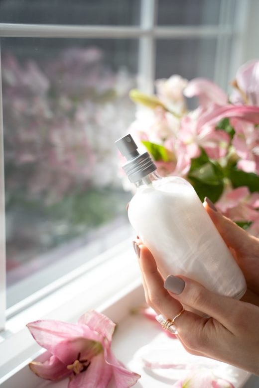 Hands holding DIY illuminating setting spray