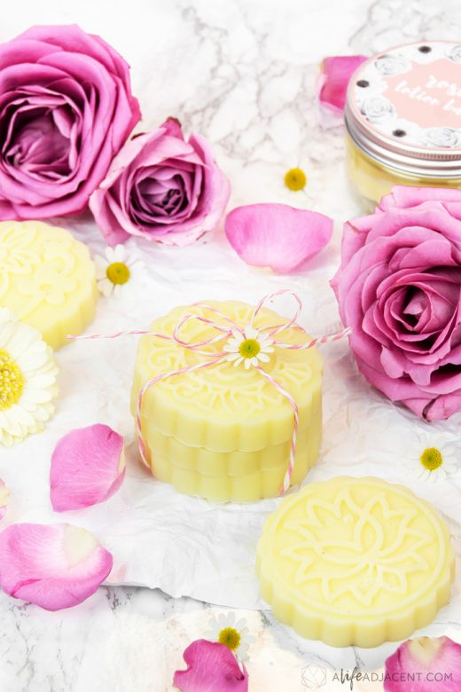 DIY rose lotion bars stacked with roses