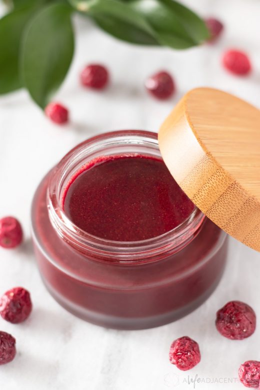 Cranberry face scrub for sensitive skin in glass jar