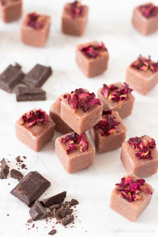 Homemade sugar scrub cubes with rose petals and chocolate