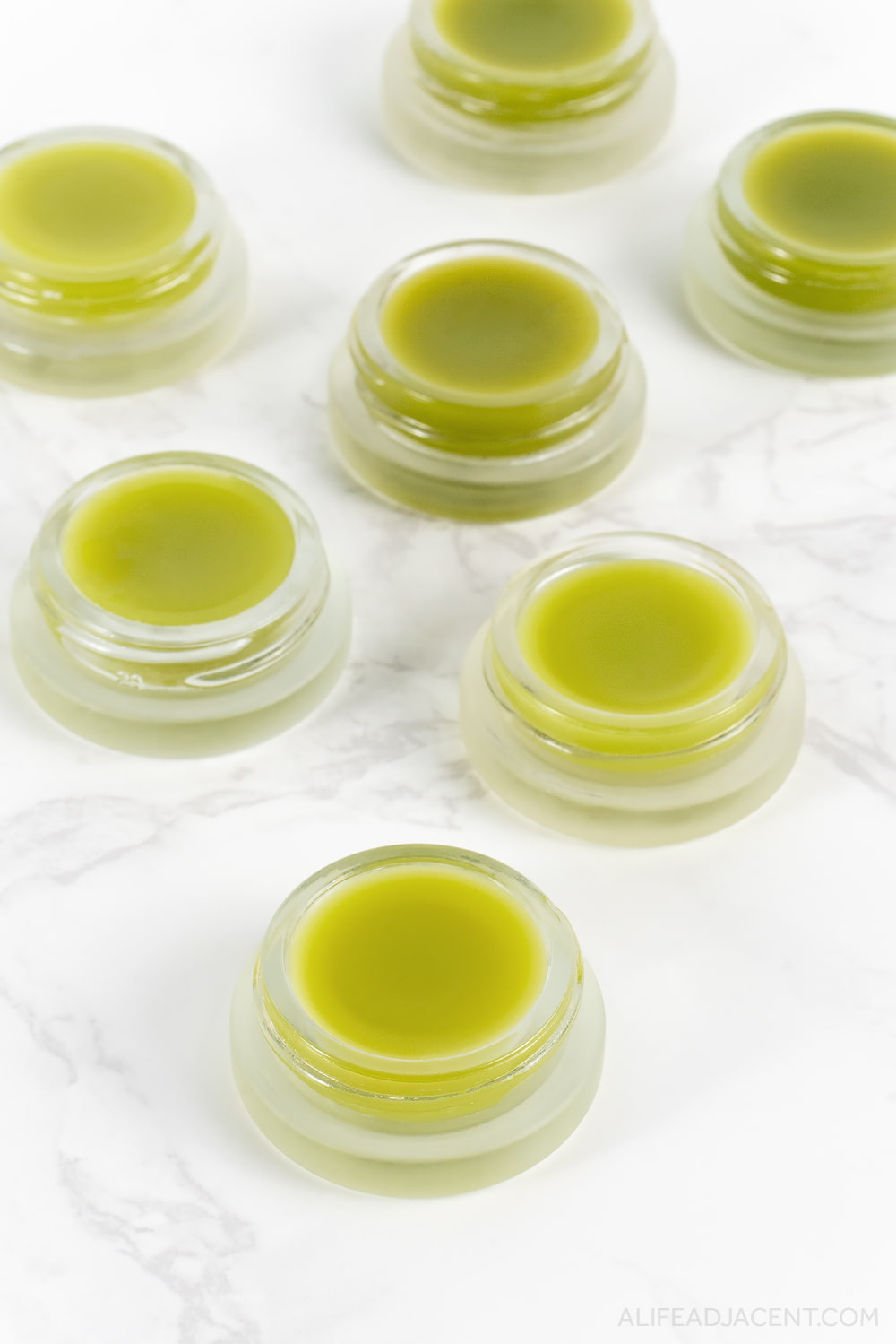 DIY green tea lip balm in glass jars