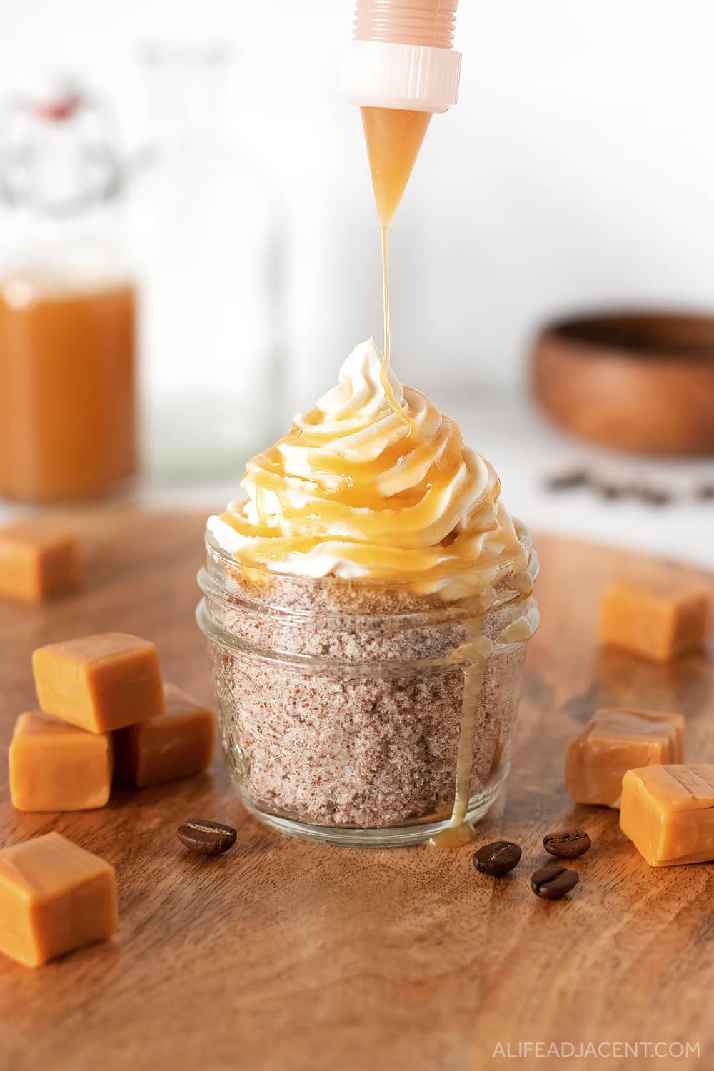 Homemade caramel latte sugar scrub with whipped soap and caramel sauce