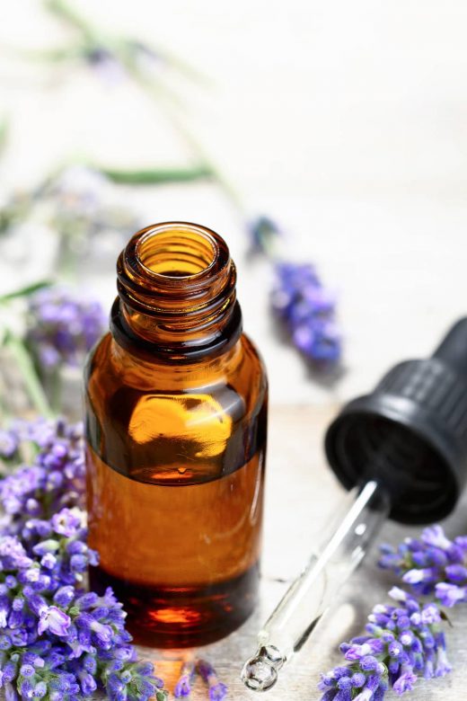 Bottle of lavender essential oil, an oil that can help prevent body odor.