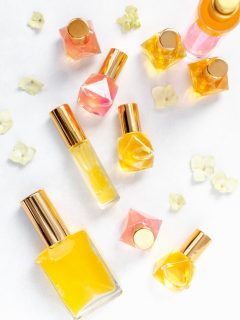 Bottles of homemade essential oil perfumes for spring.