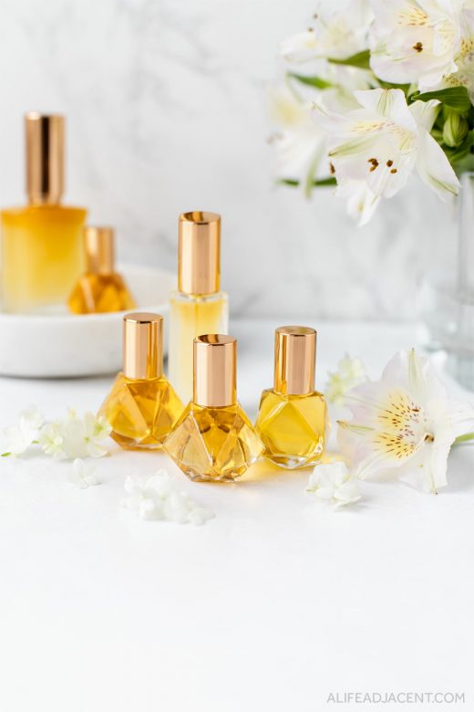 DIY perfume with essential oils and flowers.