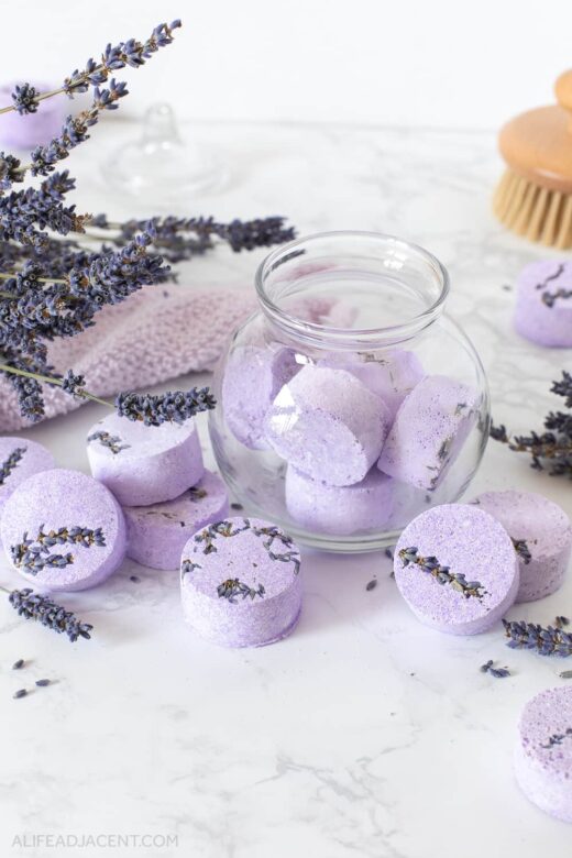 DIY shower fizzies with lavender in glass jar.