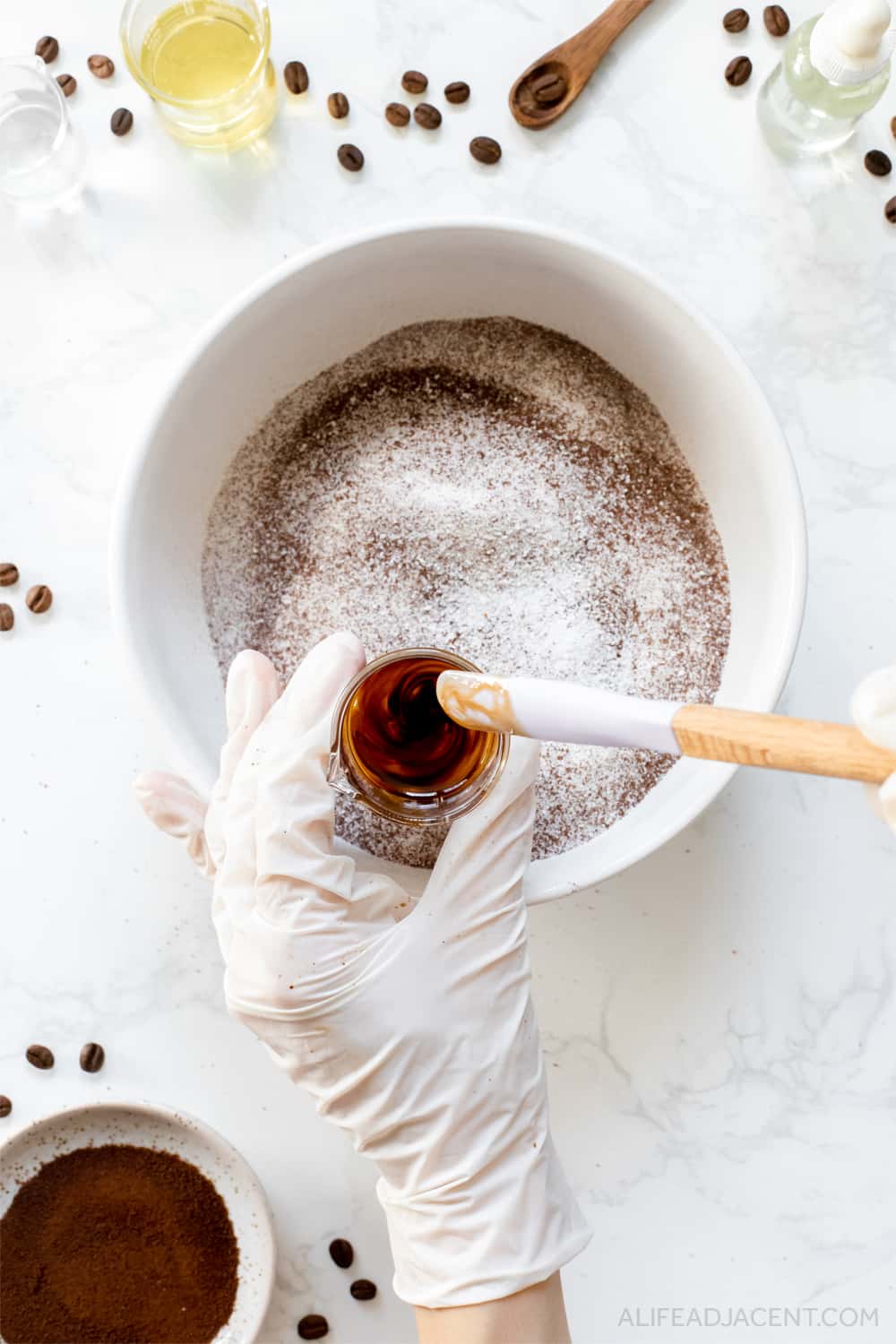 Combining bath bomb emulsifier, coconut oil and coffee essential oil for DIY bath bombs.