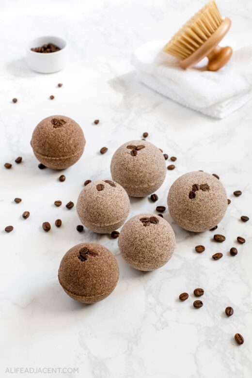 Coffee infused bath bombs with coffee beans.