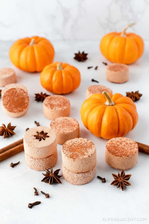 Pumpkin spice DIY aromatherapy shower bombs. Close up and stacked.