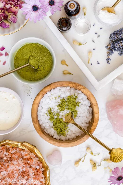 Ingredients for green tea bath soak recipe – Epsom salts, pink Himalayan salt, matcha, milk powder, and jasmine flowers