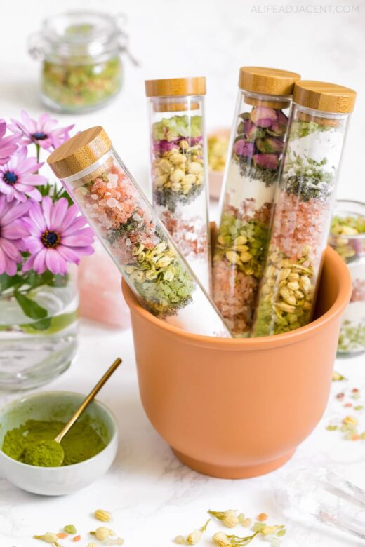Test tube bath salts with flowers, green tea and botanicals