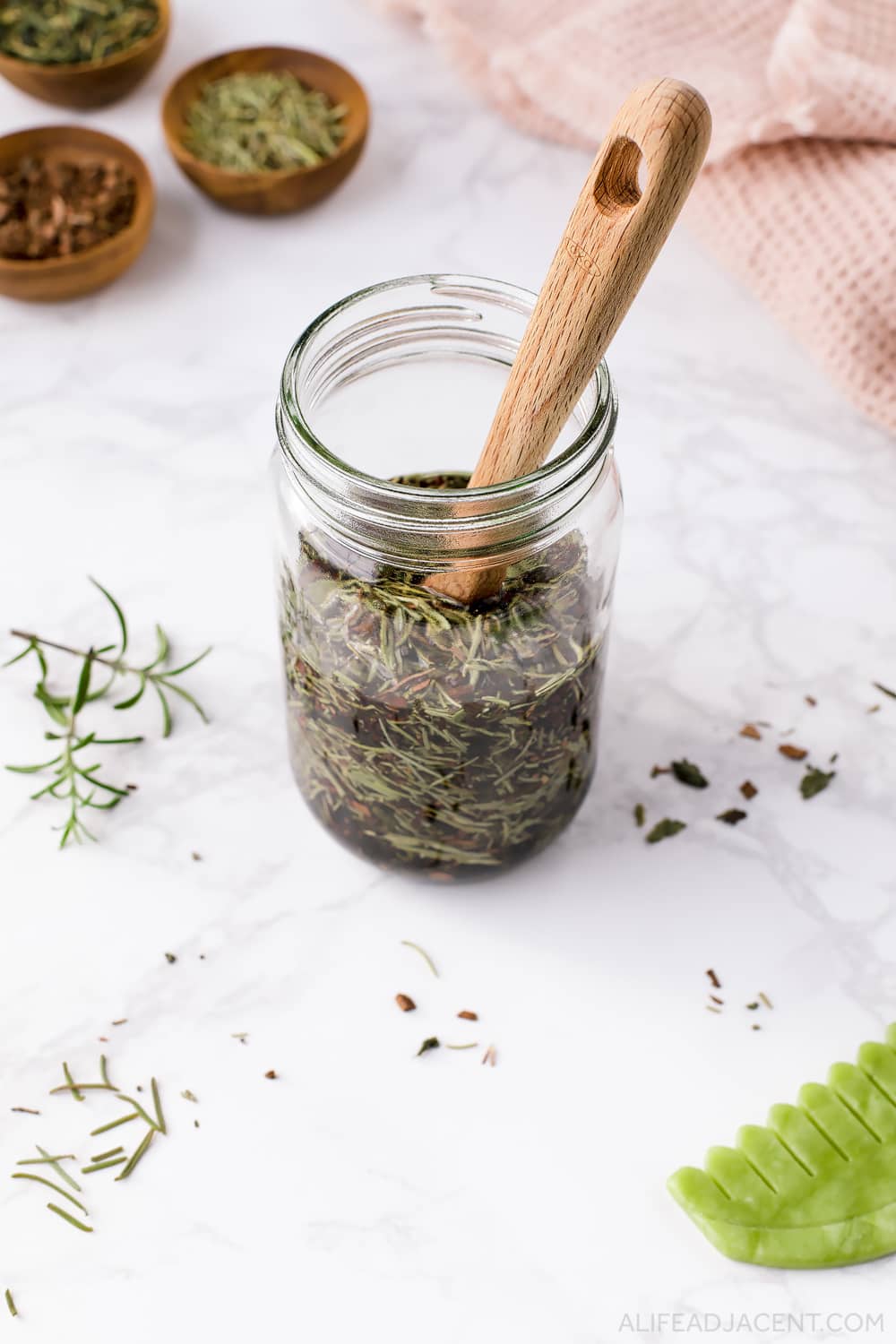 Herbal infused oil with fractionated coconut oil.
