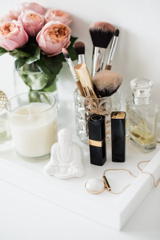 Makeup and beauty products on makeup vanity table