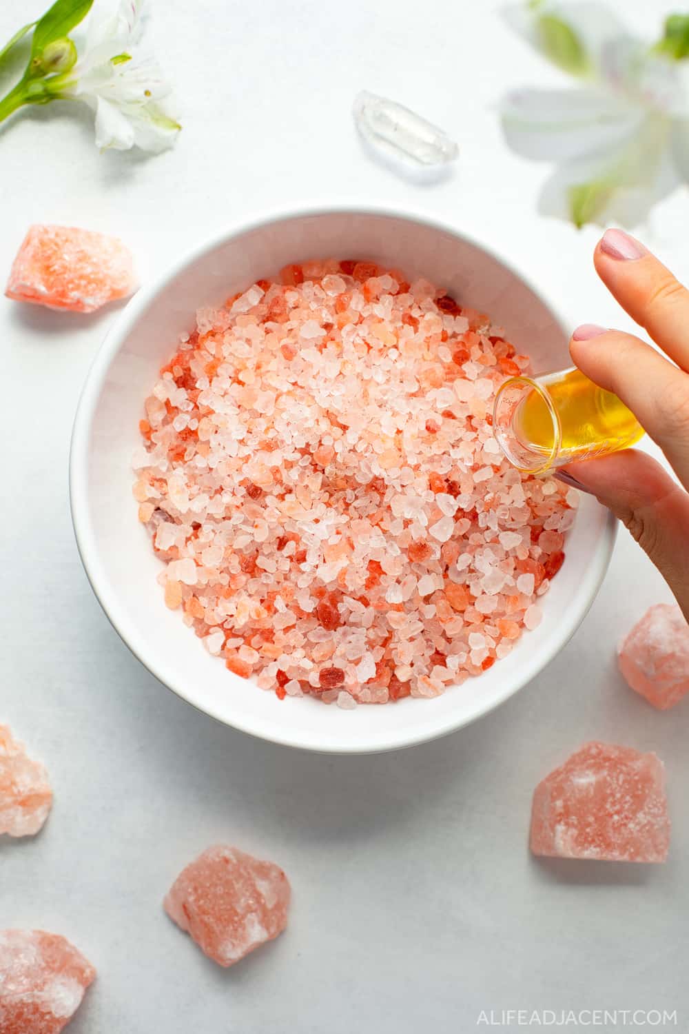 Adding essential oils to Himalayan pink bath salts