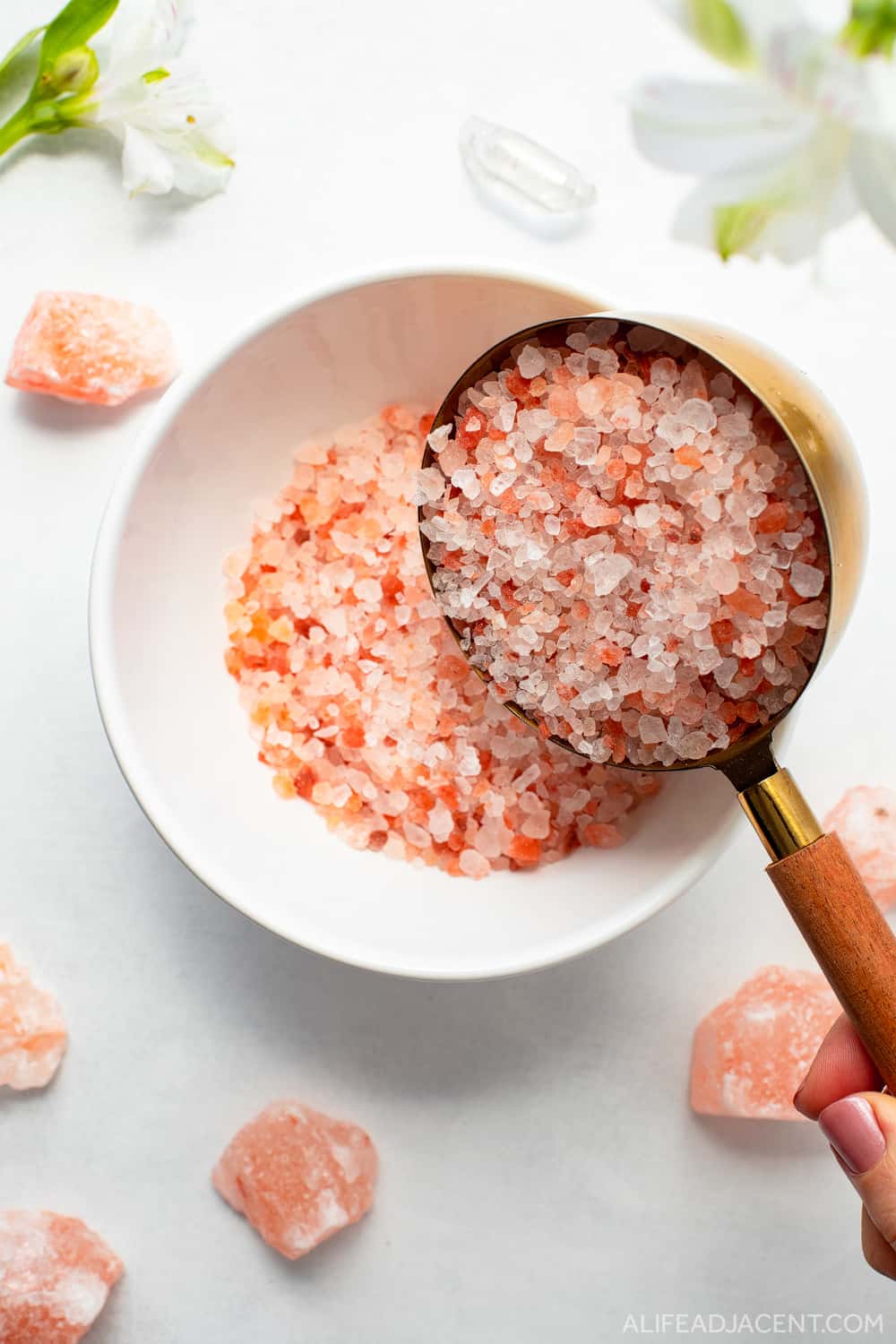 Pink Himalayan salts in mixing bowl