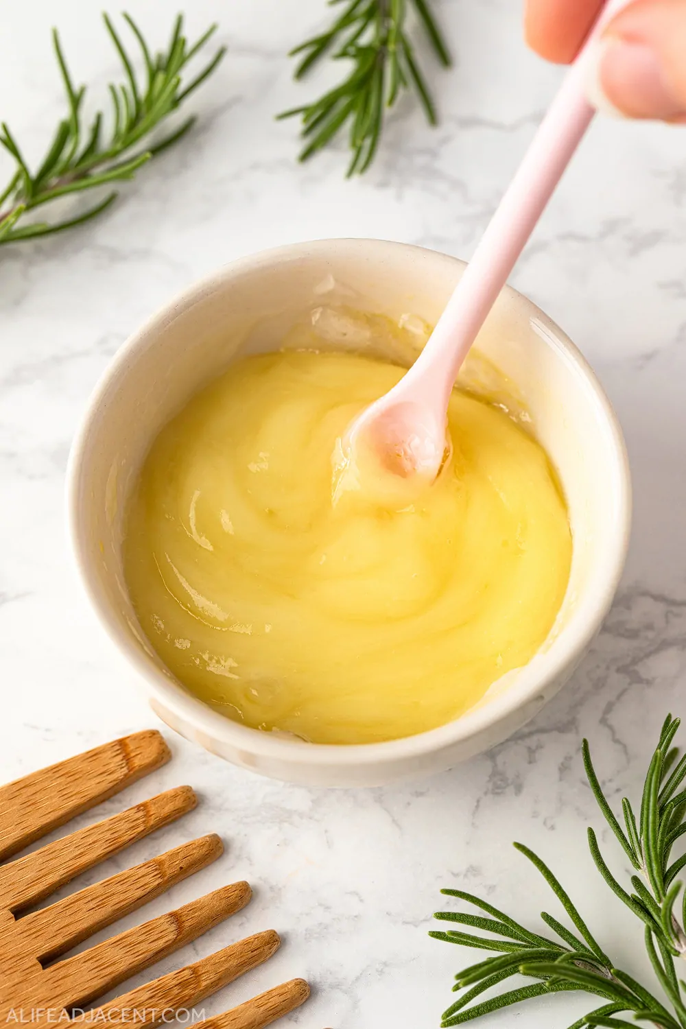 Emulsified hair mask ingredients in bowl.