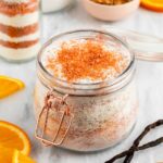 DIY orange vanilla bath recipe with creamsicle essential oil blend, Epsom salts, and orange slices