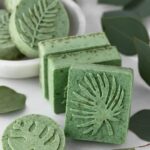 Homemade eucalyptus soap bars scented with eucalyptus essential oil.